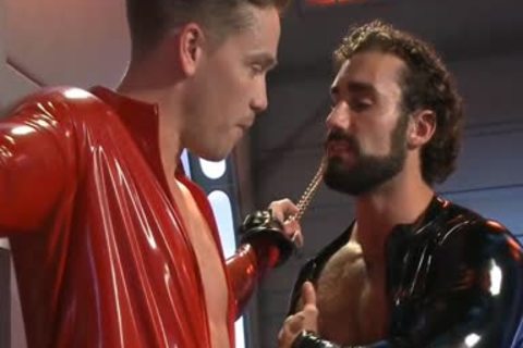 sadomasochism Poor twink In Shiny Catsuit tied And nailed