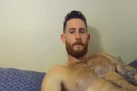 stylish And brawny guy Caressing His Hard shlong